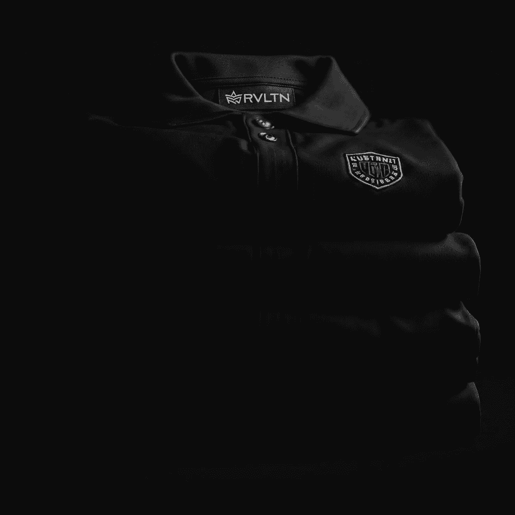 Stack of embroidered RVLTN team polos